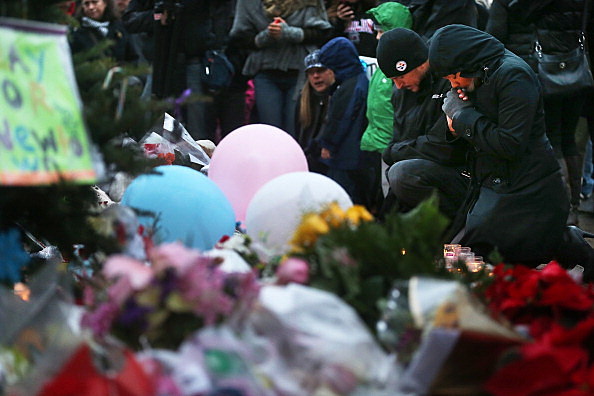 People gather at a memorial for Connecticut Elementary School Shooting People gather at a memorial for Connecticut Elementary School Shooting