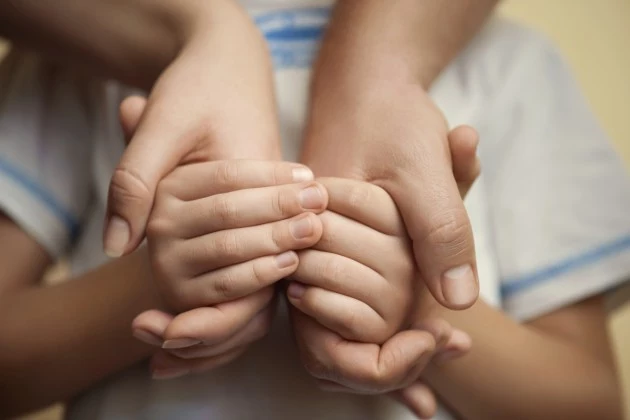 Family Holding Hands - Credit- - 162973468
