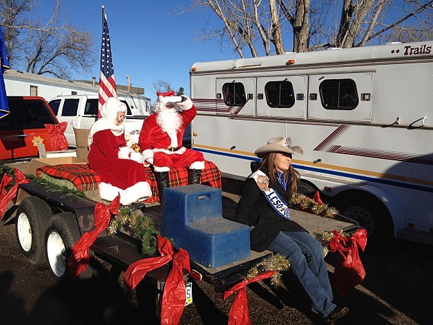 Santa & Mrs. Claus with Larimer County Sheriff's Posse Queen Santa & Mrs. Claus with Larimer County Sheriff's Posse Queen