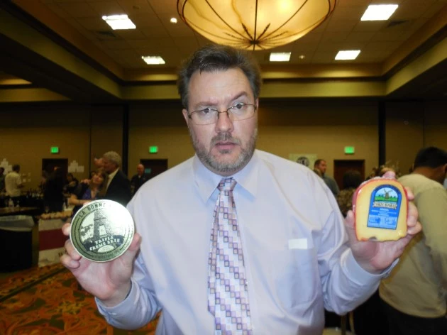 Todd with cheese that was given to him at Wine Fest 2014 Todd with cheese that was given to him at Wine Fest 2014